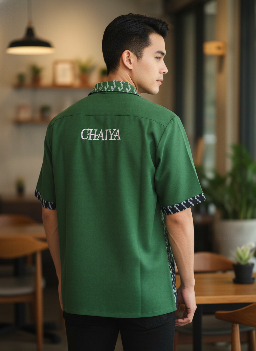 เสื้อทีมผ้าไทย ลายมัดหมี่ ด้านหลัง เสื้อทีมผ้าไทย ลายมัดหมี่ ด้านหลัง
