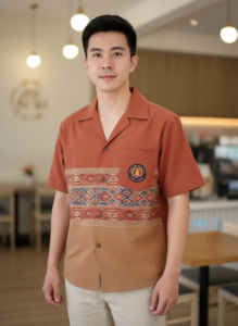 เสื้อทีมผ้าไทย ลายมัดหมี่ ทรงฮาวาย (เทอร์ราคอตต้า-น้ำตาลอ่อน) – ออกแบบเสื้อทีมผ้าไทย รับผลิตเสื้อทีมผ้าไทย
