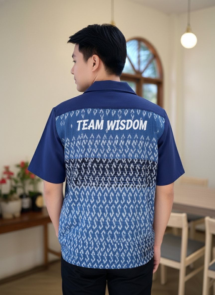 เสื้อทีมผ้าไทย ลายมัดหมี่ ด้านหลัง เสื้อทีมผ้าไทย ลายมัดหมี่ ด้านหลัง